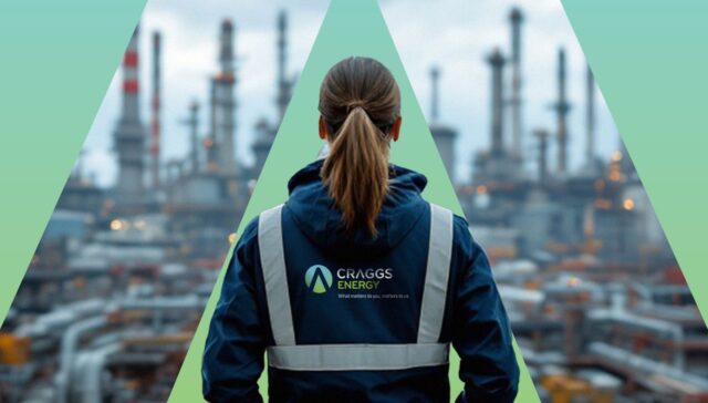 A female industry worker in safety gear gazing at an oil refinery with smokestacks in the background, symbolizing energy and industrial progress.