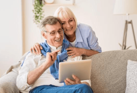 Older couple looking at iPad