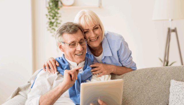 Older couple looking at their iPad